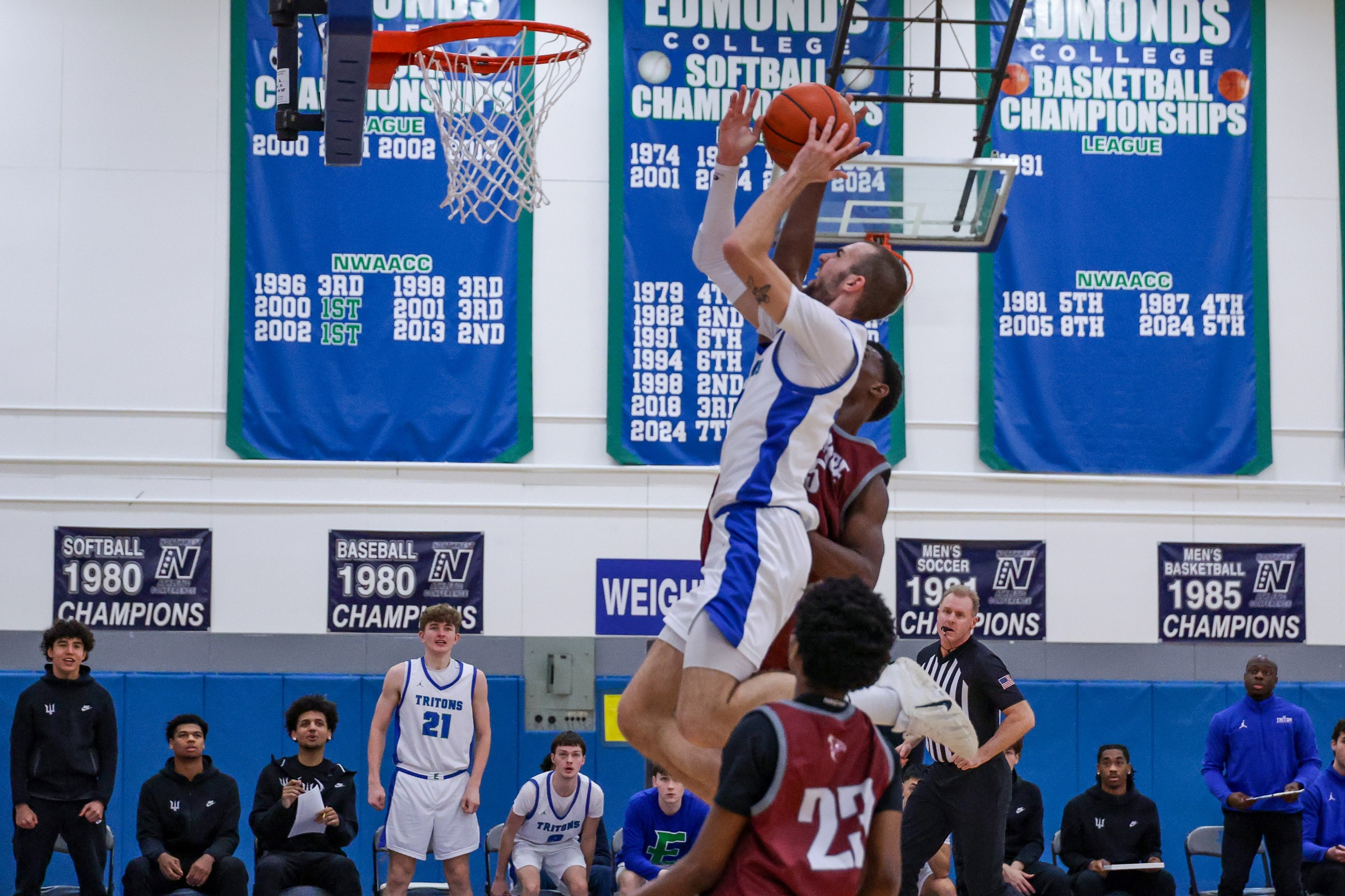 Top ranked Cardinals down Tritons